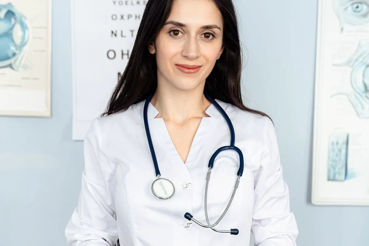 A physician in a clinical consultation room