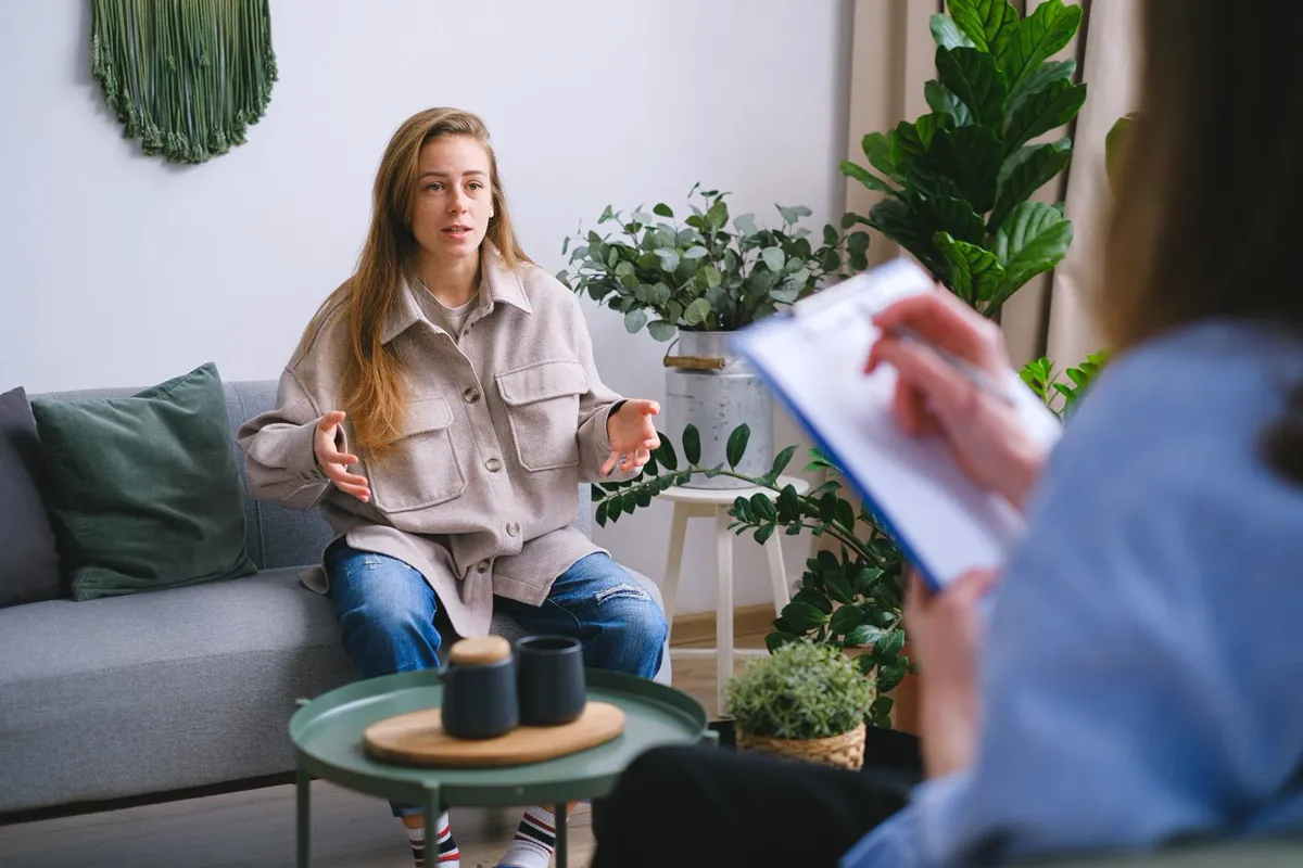 A counselling session taking place in a consulting room